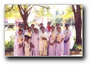 Sisters posing in Puttaparthi - Click to enlarge